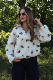 Kremowy polar w kwiaty z suwakiem przy szyi